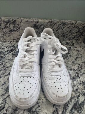 Women’s White Nike Sneakers with Black Swoosh